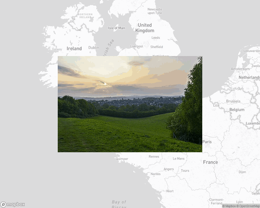 A photo of or from a park from the linked website, overlaid on a cropped world map where it's located.
