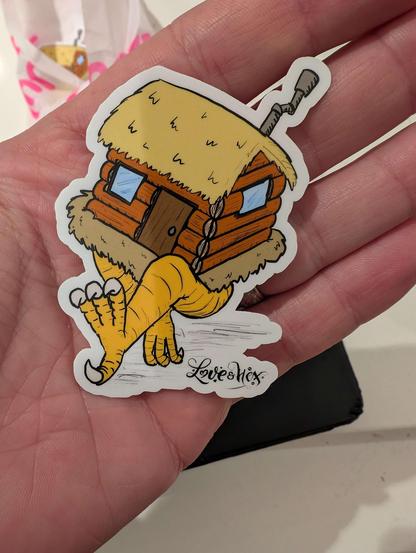 A sticker of Dojo the baby house from the Love and Hex comic, sauntering without a care in the world.