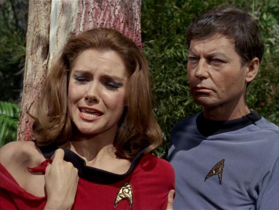 Moments after Yeoman Barrows is attacked. The uniform is torn from the right shoulder.