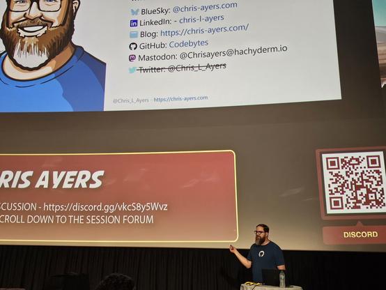 Chris Ayers presenting The Power of Dev Containers and GitHub Codespaces session at Stir Trek
