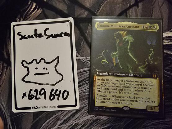 An "Obuun, Mul Daya Ancestor" Magic: The Gathering card alongside a Scute Swarm infinitoken marked with "×629,640".