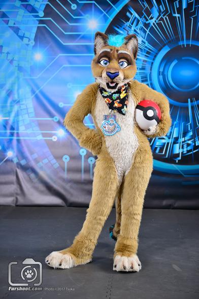 Lioness fursuiter posing with Pokeball