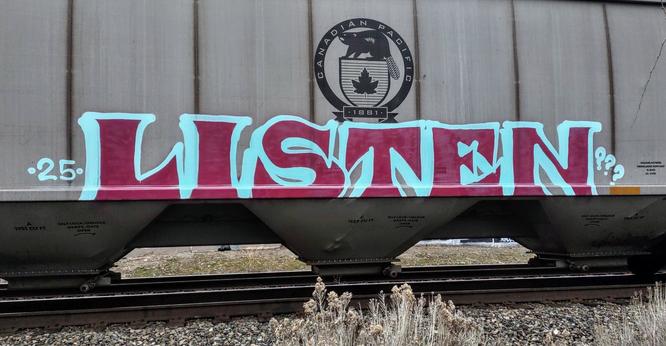 Train car with graffiti rolling through Kamloops BC Canada
