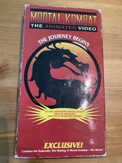 A VHS copy of Mortal Kombat: The Animated Video - The Journey Begins.

"Go one step beyond virtual reality with 3d animation like you've never seen before!"

Contains the featurette: The Making of Mortal Kombat The Movie.