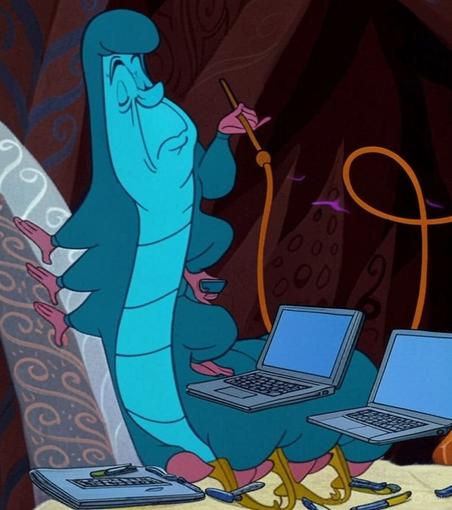 A Caterpillar teaching several workshops at once, surrounded by laptops and tools for each set of “hands”