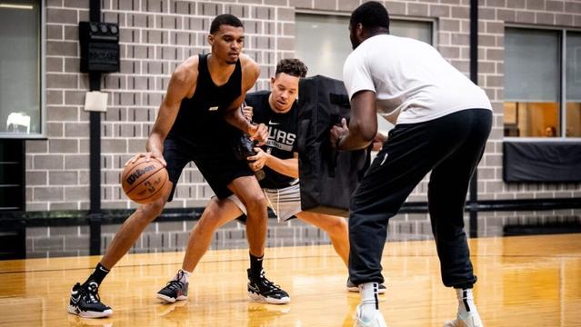 Who is Spurs head coach Mitch Johnson? He replaces Gregg Popovich