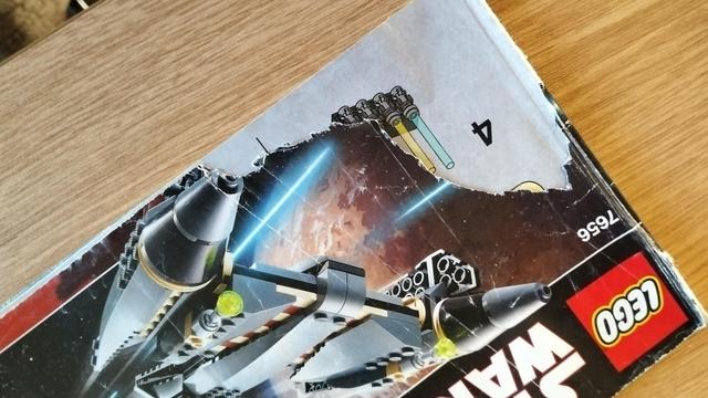 Lego StarWars manual from which 10% of the front page has been almost surgically removed