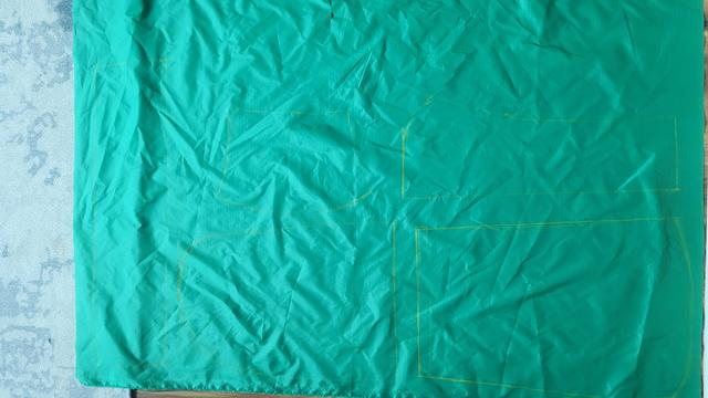 Green ripstop with pattern roughly marked in crayon.