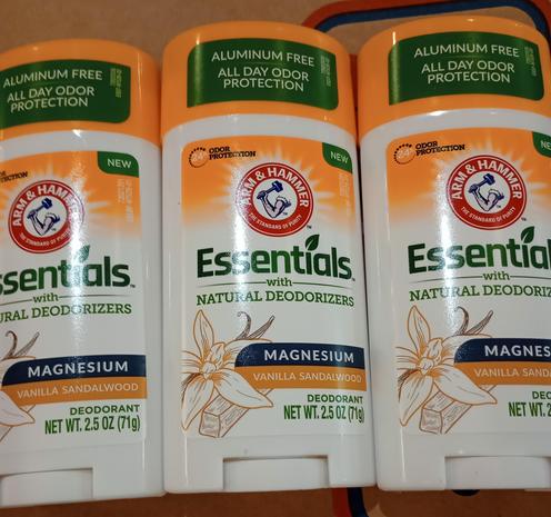 Three containers of deodorant
