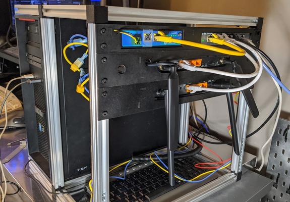 The rack, with fewer (but not zero) cables strung around randomly
