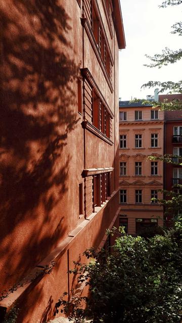 Sun and shadows on red houses.