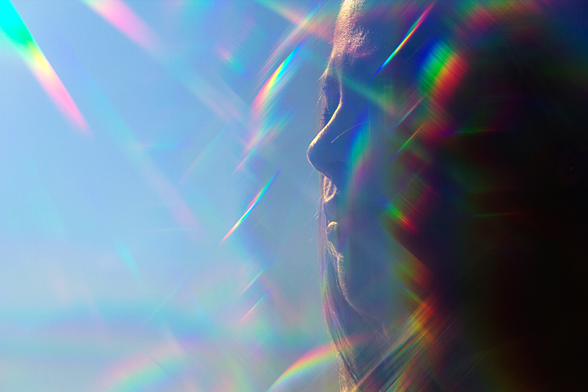 A closeup of a woman enjoyin sunshine