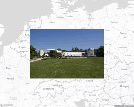 A photo of or from a park from the linked website, overlaid on a cropped world map where it's located.