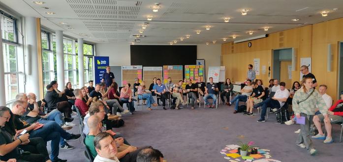 people gathering in the main room