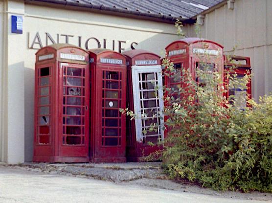 A row of (inactive) phone boxes.