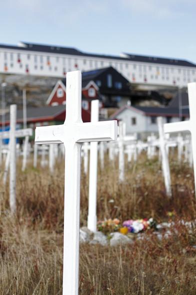 white crosses of a graveyard in greenland