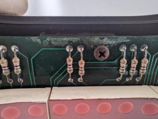 top of the LED matrix board, some light corrosion and rusted out screw
