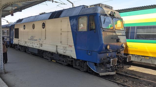 A huge, blue diesel locomotive at Bucuresti Nord.