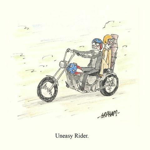 A cartoon illustration of two nervous men driving a chopper dressed like the characters from the movie "Easy Rider." Caption reads "Uneasy Rider."