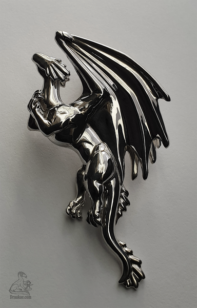 Dragon in silver holding it's hands to its chest. The pose is looking/flying upwards.