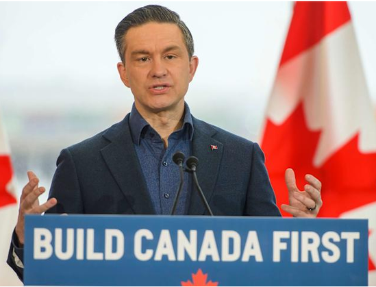 March 2025 photo of Poilievre giving a speech with a "Build Canada First" sign.