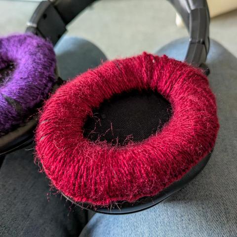 The same earphone, wrapped in red yarn to keep the flakes at bay.