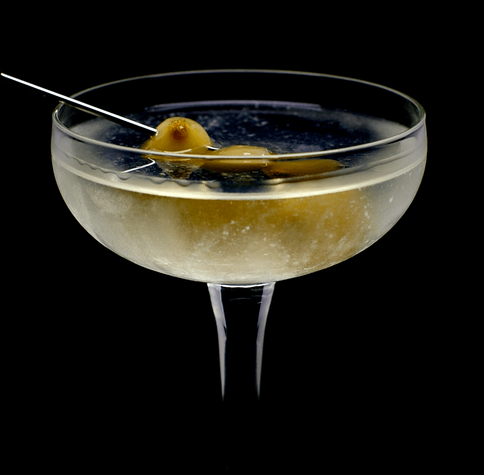 the cocktail itself in a chilled coupe and garnish with 3 cocktail onions