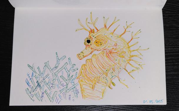 fineliner sketch of a yellow sea horse. With it's big eye it looks a bit startled. also it has twig-like appendages, making it look tattered.