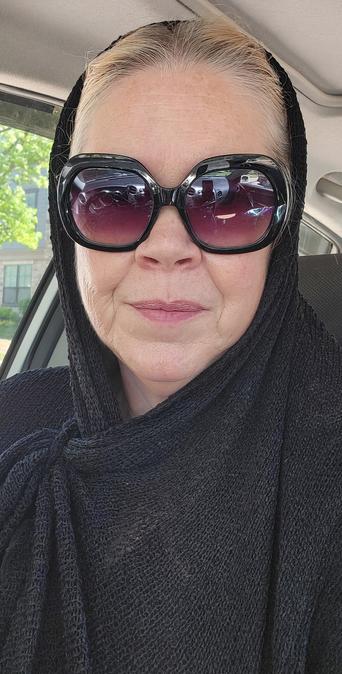 Selfie Ho on her way to protest domestic terrorism.