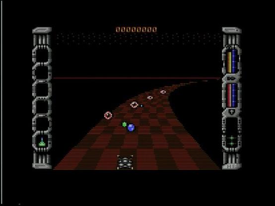 In-game screenshot of the the Hewson game "Eleminator" - the player ship (seen from behind in a pseudo 3D view) follows along a reddish chequerd path, winding to the right. Enemy aliens, looking like eyeballs, are approaching the player shit, shooting green bullets.
