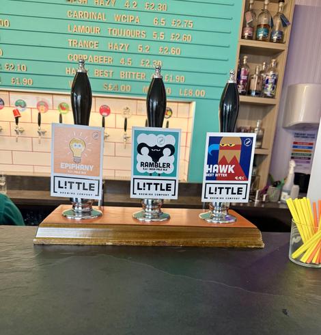 A shot of the beer pumps. Three Little Brewery beers. Epiphany, Rambler, and Hawk.