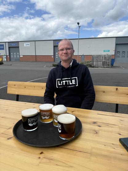 Hello. It’s me. Wearing my Little Brewery hoodies sat outside drinking four different brews. They range from a dark stout to a light ale.