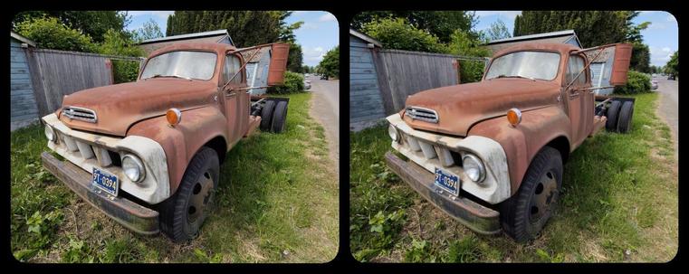 A rusty Studebaker pickup truck.