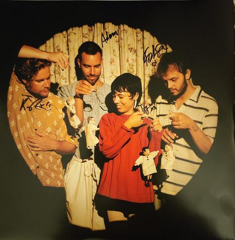Singed inner sleeve photo of the Band