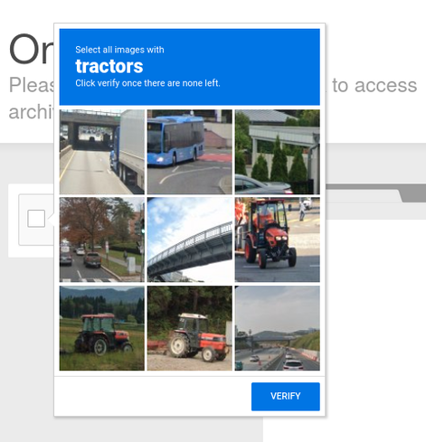 A Google reCAPTCHA pop-up asking the user to select all images with tractors.