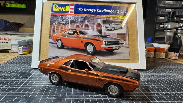 Finished Dodge 1970s Challenger T/A in front of the box art.