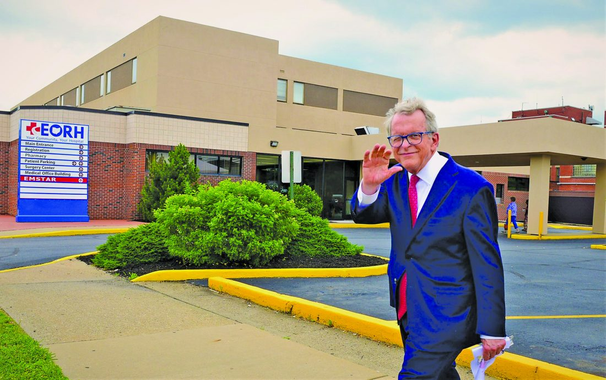 Gov DeWine winking in front of EORH hospital