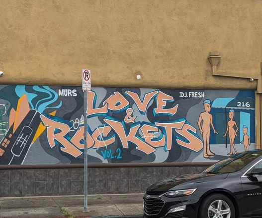 Mural with Love and Rockets vol 2 on it
