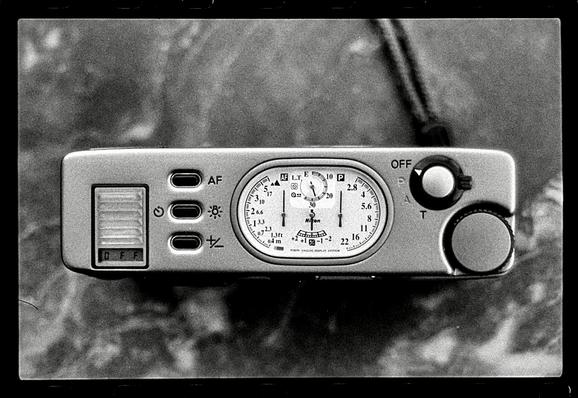 A top down black and white photo of the Nikon 35ti.