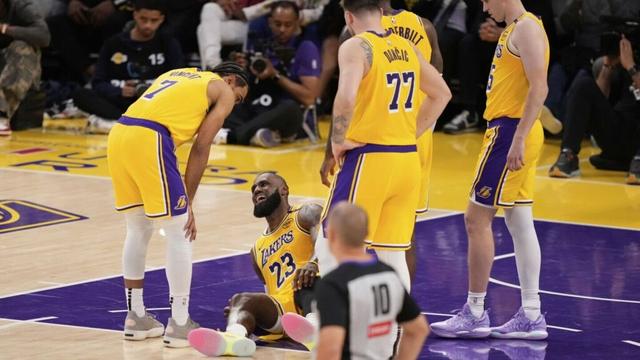 LeBron James sprained a knee ligament in Lakers' final loss to Wolves, an AP source says