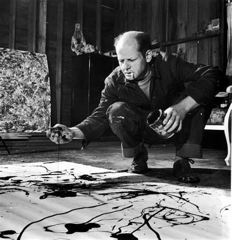 Jackson Pollock in a moment of creating his “action” art.