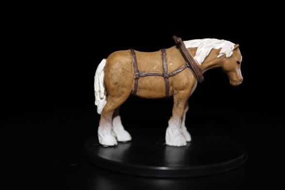This is a photo of the draft horse miniature which I use in my Dungeons and Dragons 5th edition games.
