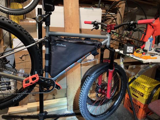 Photo of test fit of Salsa triangle frame pack planning inner bolt mounting removing straps