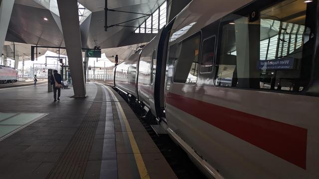 An ICE train with beautiful shadow and light projection on its outside in Vienna Hbf.