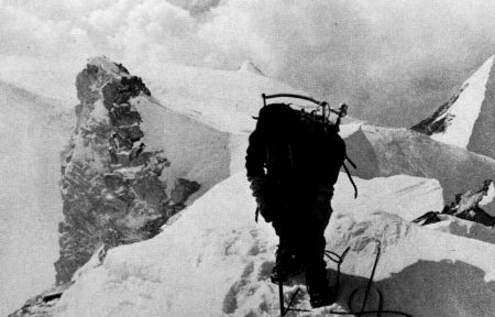 blurry photo of one of the expedition approaching the summit.