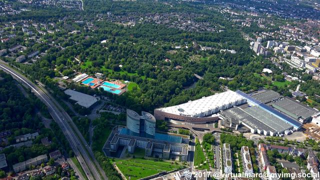 An aerial photo of the Grugapark in Essen and part of the Essen fair. The Gruga swimming pool can be seen at the left.