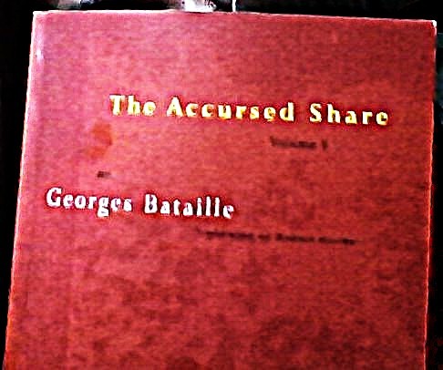 The cover of The Accursed Share Volume 1 by Georges Batallie. It is a slightly mottled red with its title in yellow, but otherwise very plain.