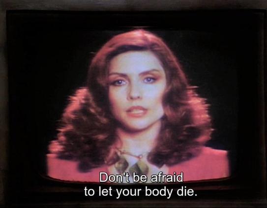 Don't be afraid to let your body die.

meme of a screenshot of a woman from a VHS video/TV in 1980’s style make -up and clothing