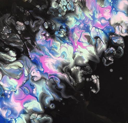 A black background with a burst of neon colors in a diagonal strip across the canvas.