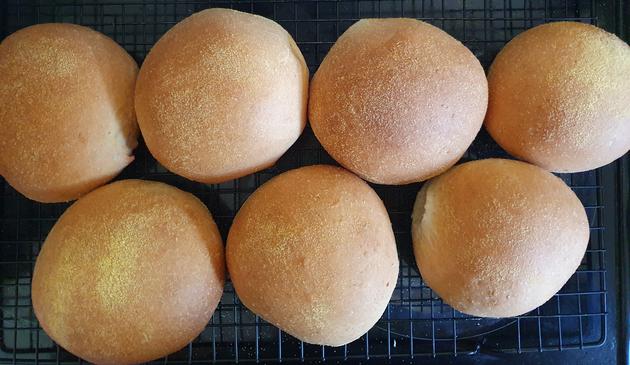 Seven baps, rather lovely and golden and round. They have fine cornmeal over them. They smell lovely =)